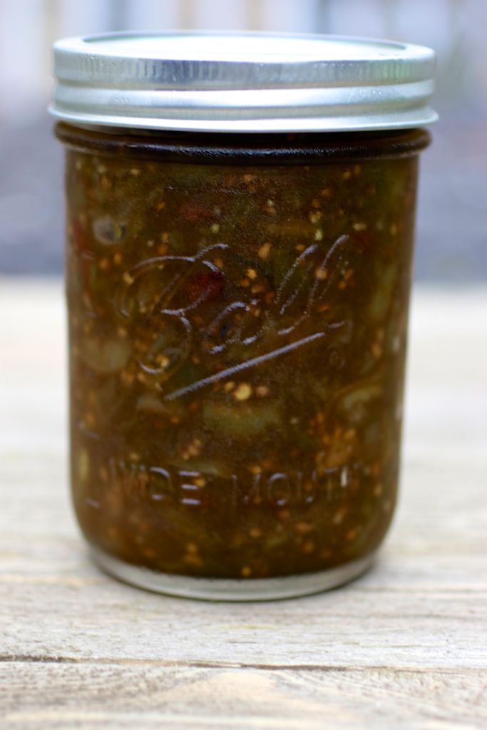 Canning jar filled with tomato chutney